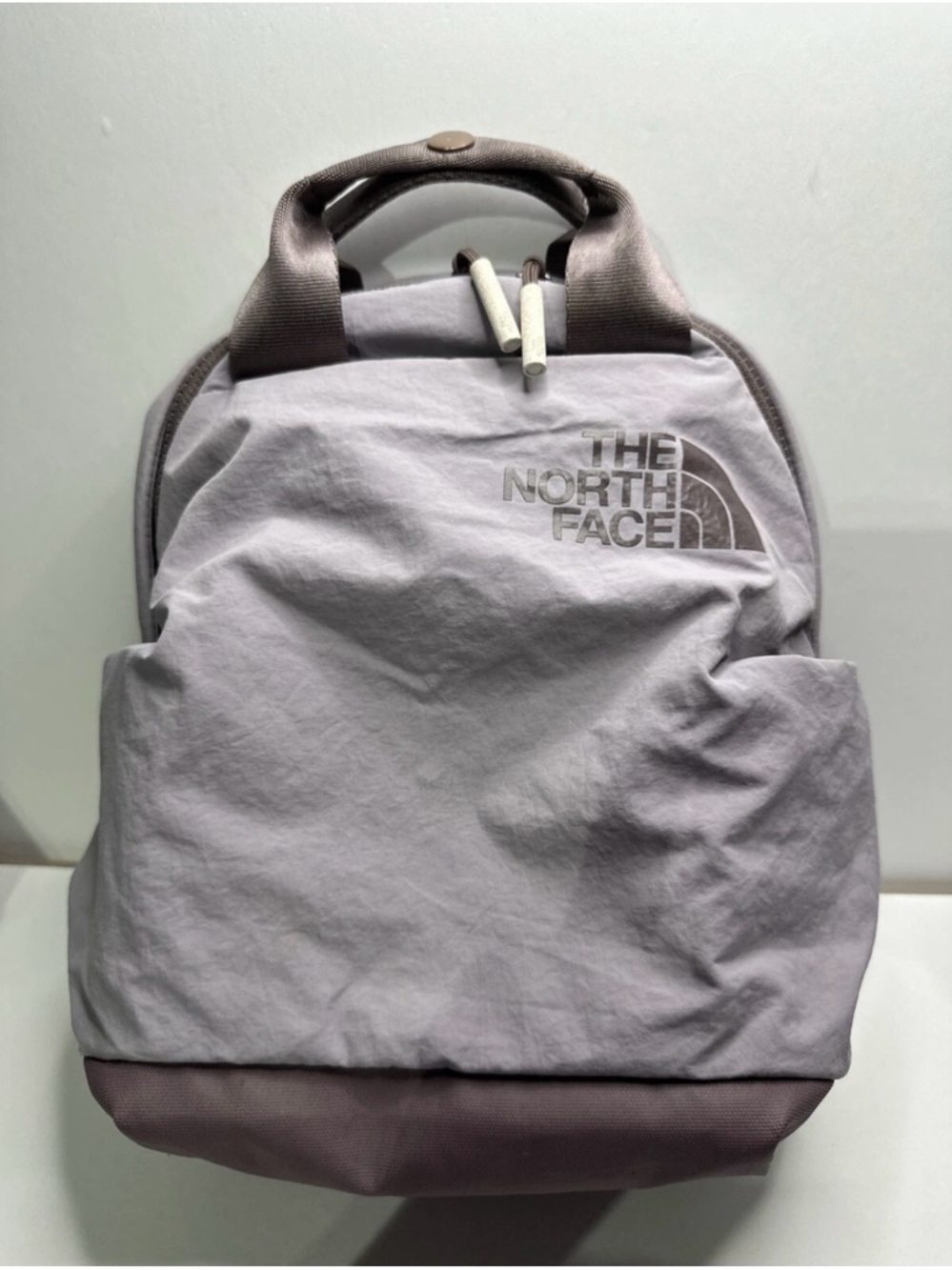 The North Face Never Stop Mini Backpack - Light Gray with Purple Accents